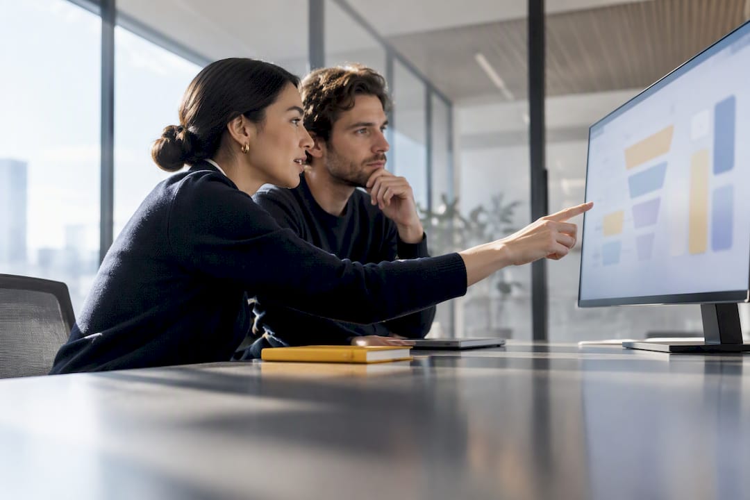 Analysts reviewing SaaS adoption gaps