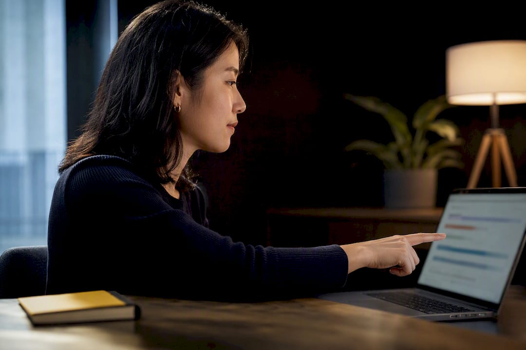 Customer success manager reviewing churn survey