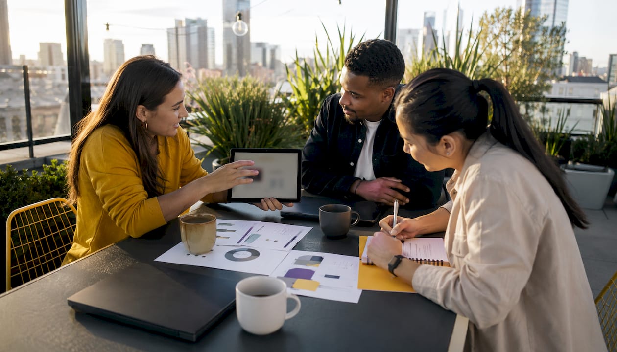 Customer success team collaborating on onboarding plans