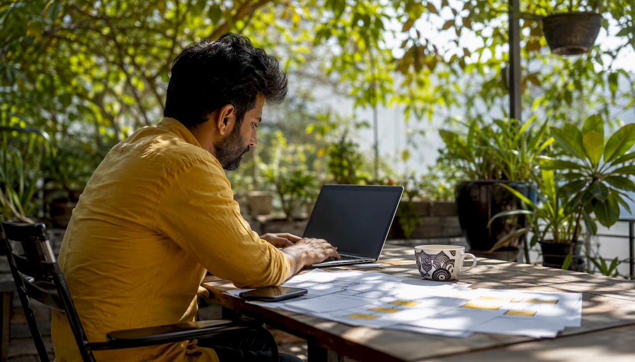 Person planning SaaS onboarding workflow