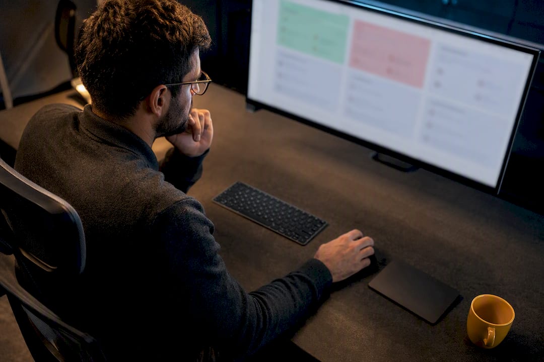 Analyst reviewing support ticket sentiment patterns