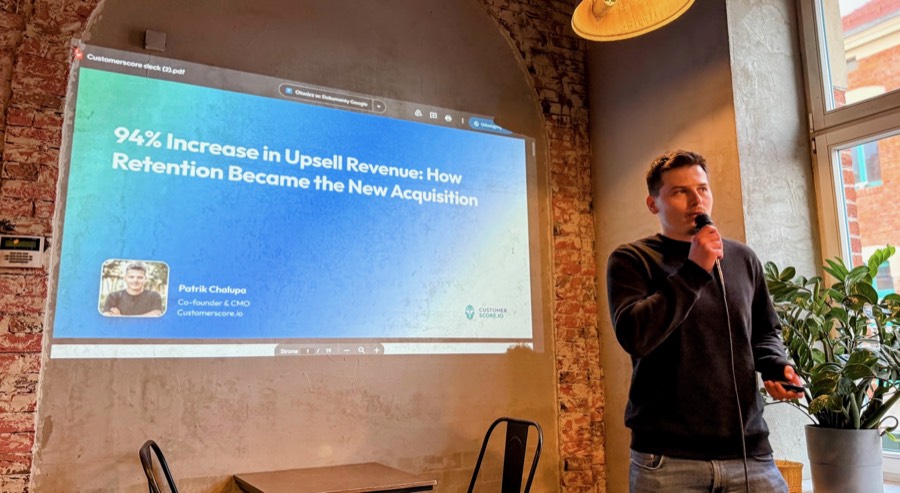 Tomas presenting the 94% upsell revenue increase case study at a meetup