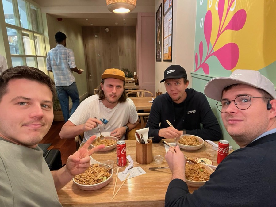 The team having dinner together after a conference day