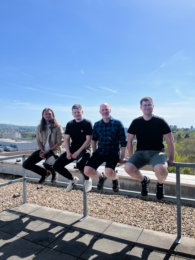 The Customerscore.io team during a brand workshop on the HQ rooftop